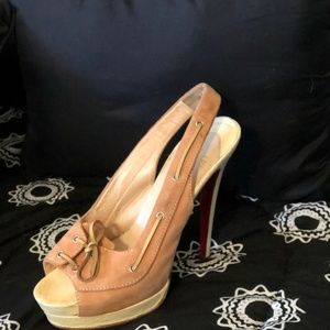 Open toe Louboutin red bottom heels